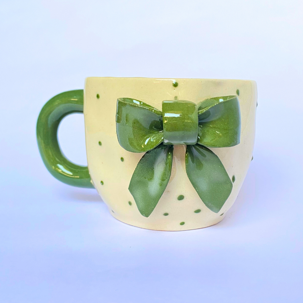 Handmade Ceramic Mug with Green Bow – Nature-Inspired Polka Dot Design