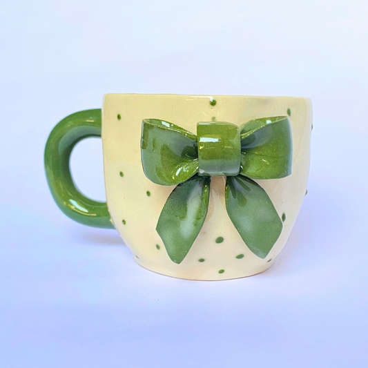 Handmade Ceramic Mug with Green Bow – Nature-Inspired Polka Dot Design