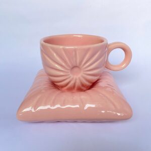 Ceramic Pink Teacup on Pillow